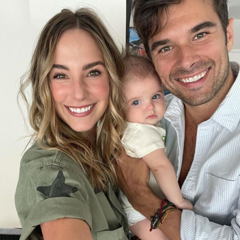Lauren Swickard with her husband and daughter