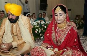 Bhagwat Mann and Gurpreet Kaur in their wedding