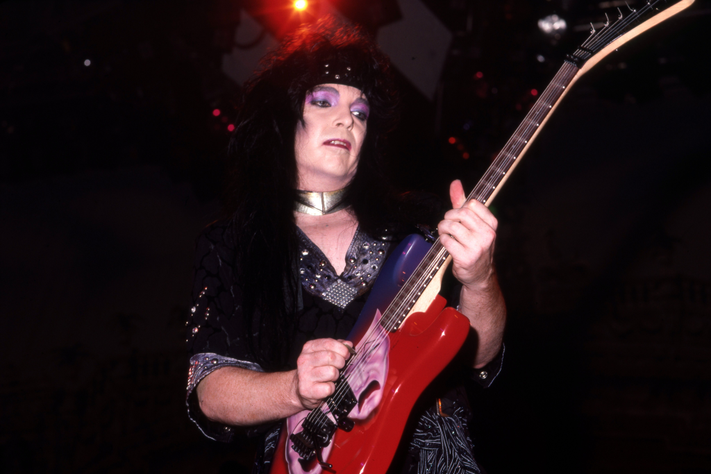 Mick Mars with his guitar